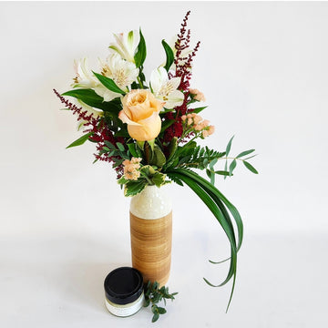 Arrangement style bouteille et bougie