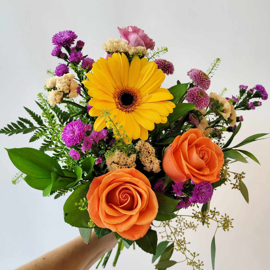 Bouquet teintes d'orange et mauve