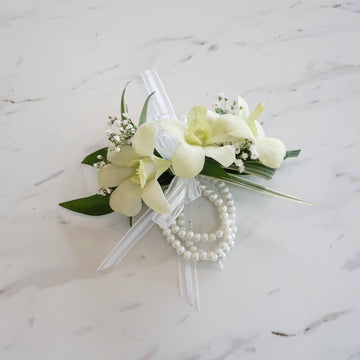 Bracelet et/ou boutonnière de graduation d'orchidées blanches